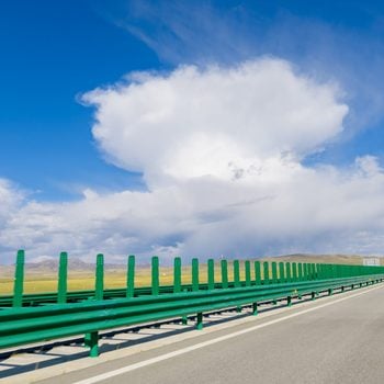 Empty road against sky